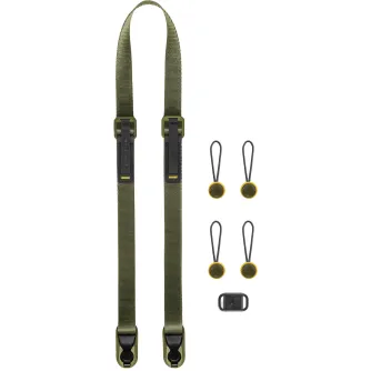 Камерный ремень Peak Design Leash в цвете келп с регулируемыми застежками, четырьмя прочными соединителями Anchor и комплектом аксессуаров, включая шестигранный ключ и микрофибровый мешочек.