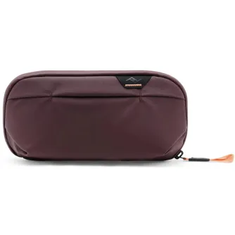 Peak Design Wash Pouch S compact toiletry bag in burgundy, featuring durable water-resistant material and a sleek design for minimalist travel essentials