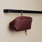 Peak Design Wash Pouch S burgundy hanging toiletry bag with stowable aluminum hook for travel organization