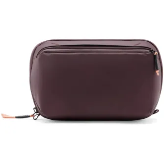 Peak Design Wash Pouch burgundy toiletry bag with waterproof UltraZip, external zip pocket, and stowable aluminum hook for travel organization