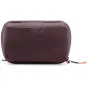 Peak Design Wash Pouch in deep maroon color, waterproof toiletry bag featuring durable UltraZip closure and compact travel design.