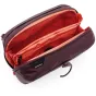 Peak Design Wash Pouch open view with organized mesh and zippered compartments, durable UltraZip closure, and magnetic toothbrush pocket