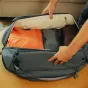 Peak Design Travel Duffelpack 65L ocean edition open view showing expandable storage and interior compartments
