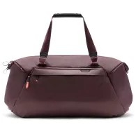 Peak Design Travel Duffel 65L in eclipse maroon, weatherproof 600D recycled nylon bag with reinforced UltraZip, padded shoulder strap, and 4 external pockets for organized travel storagePeak Design Travel Duffel 65L in eclipse maroon, weatherproof 600D recycled nylon bag with reinforced UltraZip, padded shoulder strap, and 4 external pockets for organized travel storage