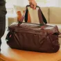Peak Design Travel Duffel 65L ar amortizētām augšējām rokturēm, izturīga 600D atkārtoti izmantota neilona soma ar ūdensizturīgu apakšējo oderi ceļojumiem un ekipējuma uzglabāšanai