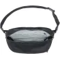 Interior view of the black Peak Design Outdoor Sling 4L cross-body bag featuring a mesh organizer and padded phone pocket.