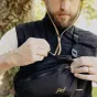Peak Design Outdoor Sling 4L black cross-body bag with adjustable padded shoulder strap and weatherproof Terra Shell™ exterior.