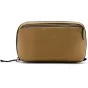 Peak Design Wash Pouch in coyote color – durable, weather-resistant toiletry bag with water-repellent fabric and smart storage pockets for travel essentials.