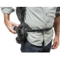 Peak Design Everyday Hip Belt V2 black with adjustable aluminum G-hook closure, padded areas, and Capture Clip attachment point, holding a DSLR camera for stability.