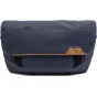 Peak Design Field Pouch V2 in dark blue, featuring a weatherproof nylon exterior, a roll-top hook-and-loop closure, and a stowable adjustable strap for versatile carrying options.