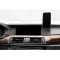 Peak Design Mobile Car Mount VHB with MagSafe securely holding a smartphone on the car dashboard for hands-free driving and navigation.