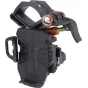 Celestron NexYZ 3 smartphone adapter featuring three-axis adjustment knobs, padded eyepiece clamp with orange accent, and spring-loaded mechanism for securing eyepieces.