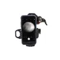 Celestron NexYZ 3 smartphone adapter with three-axis adjustment for telescopes, capturing the moon through an eyepiece with precise alignment knobs