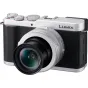 Компактная фотокамера Panasonic Lumix L10 серебристого цвета с объективом Leica 24-75 мм F1.7-2.8, вид спереди с кольцом диафрагмы и управляющими дисками