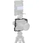 SmallRig 6114 cage for Sony A7 series with VG-C4EM grip mounted on camera, featuring Arca-Swiss plate, cold shoe mounts, and versatile accessory threading for stabilizers and handles