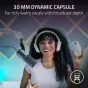 Razer Seiren V3 Pro dynamic podcast microphone with 30 mm capsule, pop filter, and Chroma RGB lighting in black, held by a smiling woman during a stream setup