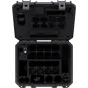 Открытый черный кейс Nanlux Evoke 5C 8-Light Kit с пенным внутренним слоем, показывающий пустые слоты для восьми осветительных приборов, магнитные модификаторы, держатели для батарей и модули CRMX. Верхний вид демонстрирует орга