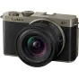 Panasonic Lumix S9 Titanium/Black camera with 18-40mm F/4.5-6.3 lens, featuring a compact design, metallic silver top, black textured grip, and visible lens mount.