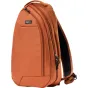Burnt orange Think Tank TurnStyle 11L Urban Rust sling bag with black mesh back panel, padded shoulder strap, zippered compartments, and camera clip rail for secure gear access.
