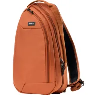 Dedzināti oranžs Think Tank TurnStyle 11L Urban Rust sling bag ar melnu sietu aizmugures paneli, polsterētu plecu siksnu, rāvējslēdzēja nodalījumiem un kameras klipa sliedi drošai ekipējuma piekļuvei.Dedzināti oranžs Think Tank TurnStyle 11L Urban Rust sling bag ar melnu sietu aizmugures paneli, polsterētu plecu siksnu, rāvējslēdzēja nodalījumiem un kameras klipa sliedi drošai ekipējuma piekļuvei.