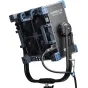 Светильник NANLUX Evoke Matrix 2500C с моторизованным Френелем, установленный на регулируемом кронштейне, с вентиляционными решетками и кнопками управления.