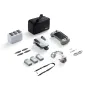 Potensic ATOM 3 drone components including remote controller with 5.5-inch display, three batteries, spare propellers, charging hub, and accessories for 4K HDR aerial photography.