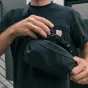 Wandrd D1 Fanny Pack with Sony camera lens, compact and secure design for travel and photography