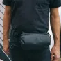 Wandrd D1 Fanny Pack - Compact hip bag with a magnetic buckle and multiple compartments for secure carrying.