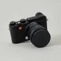 URTH 39mm magnetic lens filter cap securely attached to a Leica camera lens, showcasing durable magnalium alloy construction and sleek black design against a clean studio backdrop.