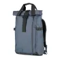 Wandrd PRVKE 31L Aegean Blue backpack with black straps and a rolled top, featuring a zippered compartment, adjustable buckles, and a padded back panel for professional gear protection.