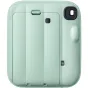 Fujifilm Instax Mini 13 instant camera in Lagoon Green with automatic exposure, compact design, and wrist strap attachment.