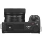 Sony ZV-E10 mirrorless camera with 16-50mm OSS II lens, directional microphone, and vari-angle LCD screen for vlogging and content creation