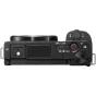 Sony ZV-E10 mirrorless camera with 16-50mm OSS II lens, featuring a directional microphone, vari-angle LCD screen, and vlogging-optimized controls
