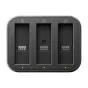 Insta360 Fast Charge Hub battery charger with three vertical slots, green LED indicators, and a compact black design for Ace Pro 2, Ace Pro, and Ace batteries.