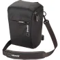Shimoda Top Loader Small camera case with expandable base, front zipper pocket, and padded shoulder strap for camera and lens protection.