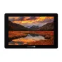 SmallHD Cine 7 ARRI Kit 7‑inch external HDR monitor displaying a vivid sunset over rugged mountains and a calm lake, with 1800 nits brightness, 100% DCI‑P3 color and ARRI camera control.