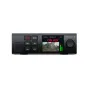 Blackmagic Streaming Encoder HD with 'ON AIR' display, guitar player, signal strength bars, and connectivity indicators