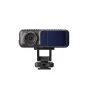 DJI Focus Pro Creator Combo follow focus unit, black compact body with red-ring lens and blue dual-screen display, mounted on a threaded bracket for professional cinematography.