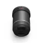 DJI DL 35mm F2.8 LS ASPH prime lens with carbon fiber body and lens cap, top view, isolated on white background