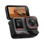 Insta360 Ace Pro 2 Creator Bundle with 8K sensor, dual AI chips, and waterproof design, capturing motocross action on its flip-out touchscreen.