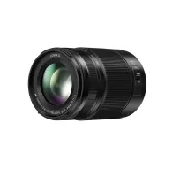 Black Panasonic Lumix G Vario 35‑100 mm F2.8 lens shown front-on with glass element, zoom ring and side power switch, highlighting its compact design and professional optics.Black Panasonic Lumix G Vario 35‑100 mm F2.8 lens shown front-on with glass element, zoom ring and side power switch, highlighting its compact design and professional optics.