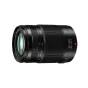 Panasonic Lumix G Vario 35-100mm F2.8 lens, black, side view with zoom ring, focal length markings 35-100mm, power switch ON, red dot, front element visible