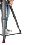 Sachtler Flowtech 100 GS tripod with ground spreader, carbon fiber legs, and red feet for stable video shooting