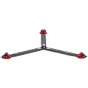 Sachtler Flowtech 75 GS tripod with carbon fiber legs, red foot pads, and quick-release mechanism, displayed in a Y-shaped spreader configuration for fast setup.
