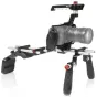 Shape Blackmagic Pocket Cinema 4K/6K offset shoulder mount cage with CNC aluminum frame, top handle, padded shoulder pad, and tripod leg support.