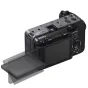 Sony FX3 full-frame Cinema Line camera with articulated LCD screen flipped out, top view showing mode dial, MENU button, and focus magnifier.