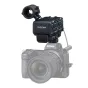 Tascam CA‑XLR2d two‑channel XLR microphone adapter mounted on a Nikon Z7 mirrorless camera with cold‑shoe clamp and detachable shock mount holder