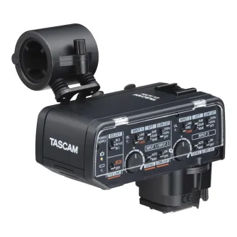 Tascam XLR Microphone Adapter for Canon Mirrorless Cameras with detachable shock mount, control panel featuring switches and knobs, Canon accessory shoe mount, transparent protective cover, and rear view showing battery compartm