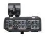 Tascam CA-XLR2D two-channel XLR microphone adapter for Canon mirrorless cameras, featuring front panel controls, phantom power, and a detachable cold-shoe mount.