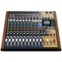 Микшер Tascam Model 16 — 14‑канальный аналоговый микшер с деревянными боковыми панелями, черной передней панелью, 14 входными каналами, белыми фейдерами, цветными поворотными ручками, встроенным LCD‑дисплеем, Bluetooth и USB‑инт